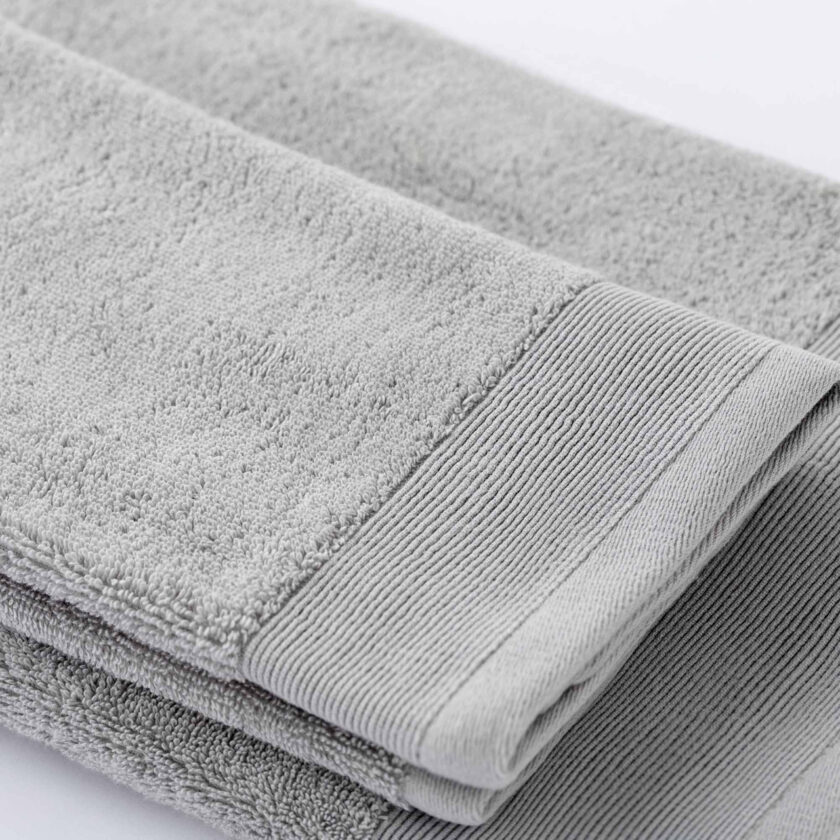 Set 1+1 asciugamani in spugna 100% cotone Glamour grigio chiaro - immagine 2