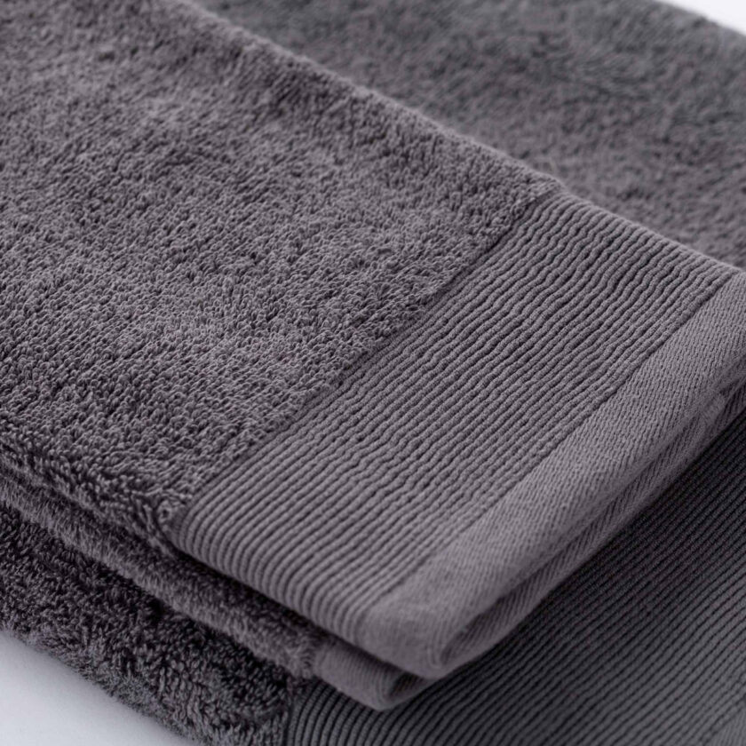 Set 1+1 asciugamani in spugna 100% cotone Glamour grigio scuro - immagine 2